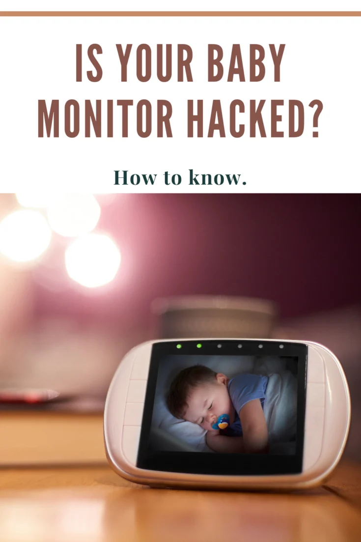 Baby monitor on the coffee table of the living room with the image of the baby sleeping on the screen