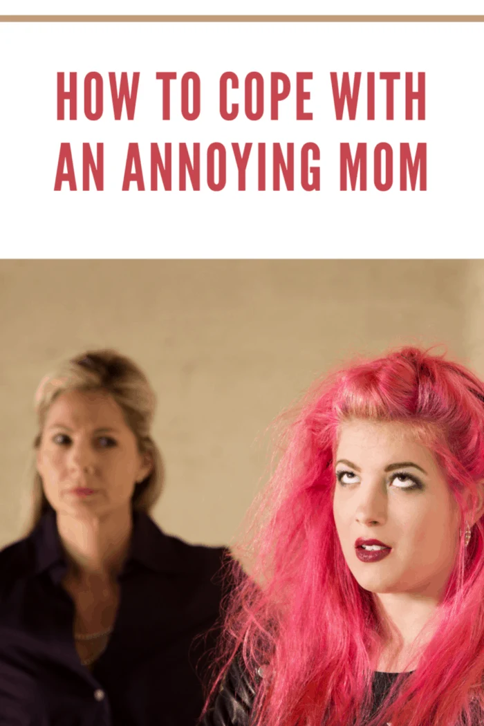 Annoyed girl in pink hair with upset parent