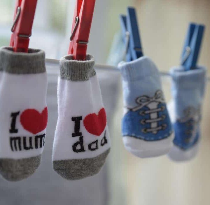 baby socks hanging on laundry line