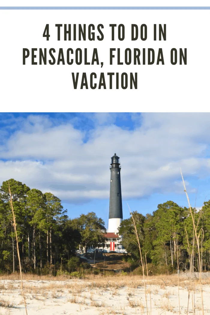 Sand Dunes with Pensacola Lighthouse in the background near Pensacola Naval Air Station in Florida.