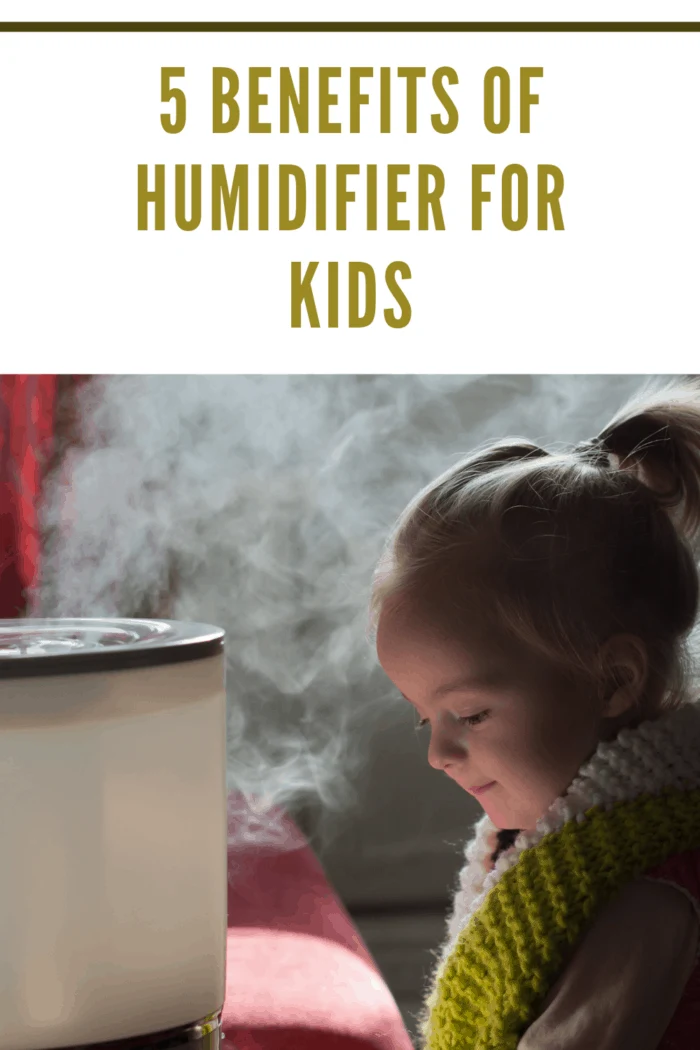 Little girl playing near humidifier reaping the benefits