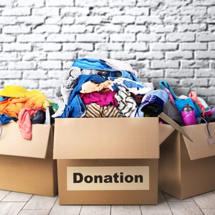 Three donation boxes in room during donation drives