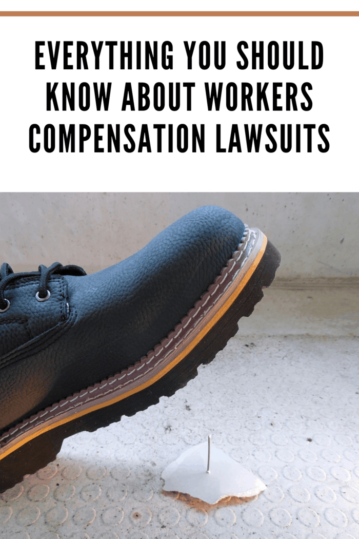 black workboot about to step on piece of drywall with nail sticking up representing a workers compensation lawsuit