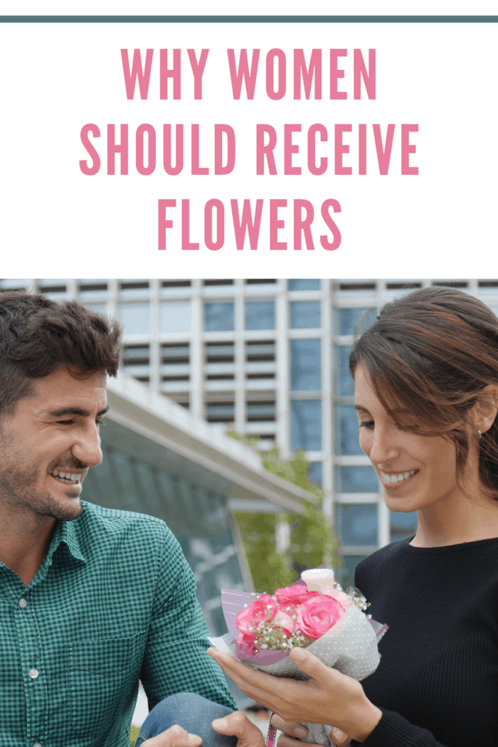 Caucasian woman receiving flower bouquet from her boyfriend