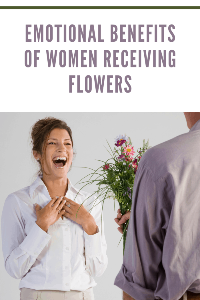 Surprised woman receiving flowers from man