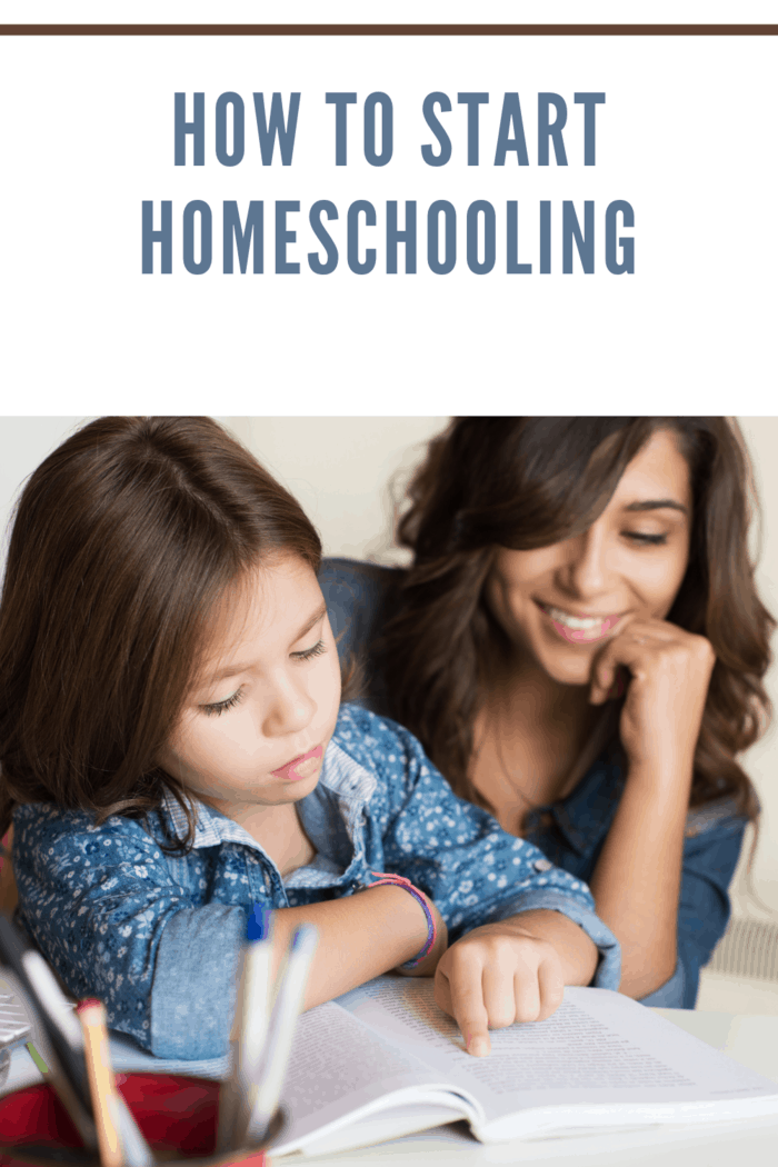 Mother helping her little child with homeschooling