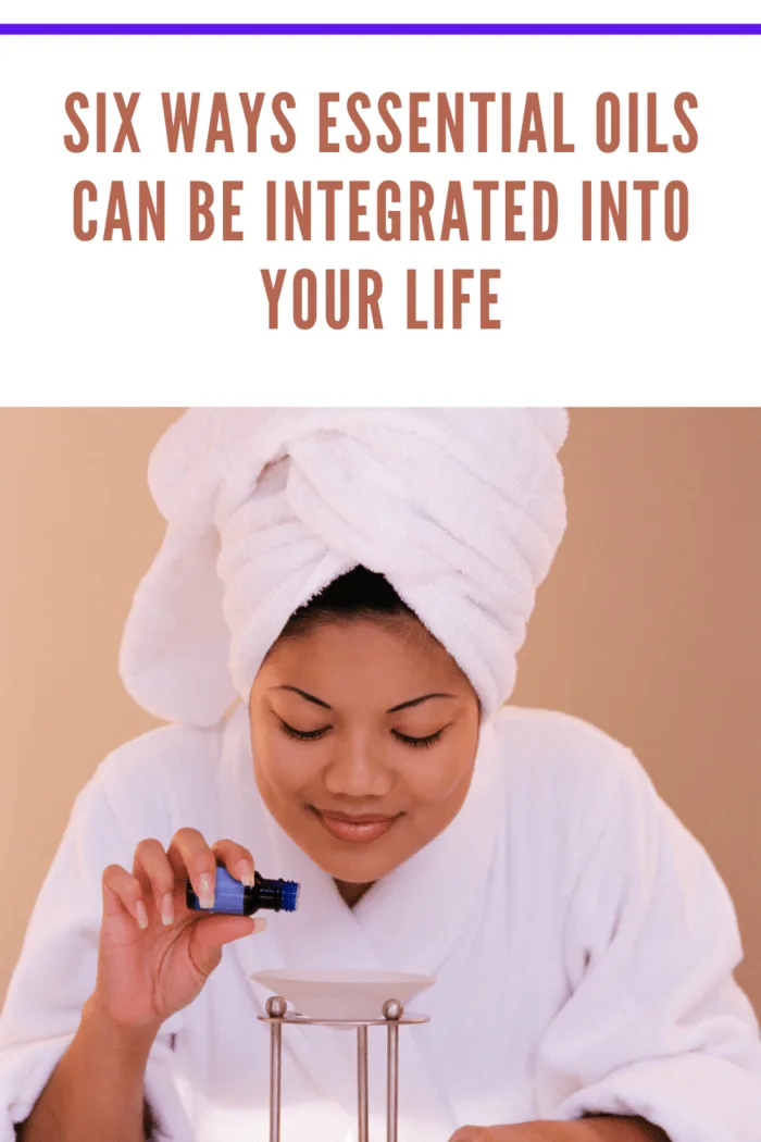 Woman using aromatherapy burner