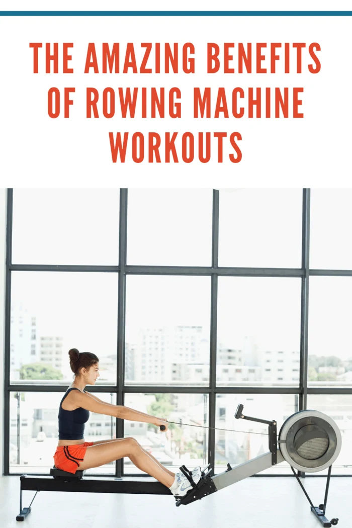 side profile of a young woman exercising on a rowing machine in a gym