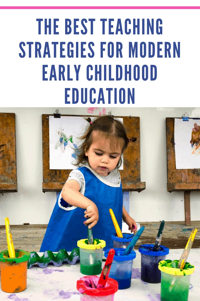 Adorable little girl painting and drawing as one of the best teaching practices for early childhood education