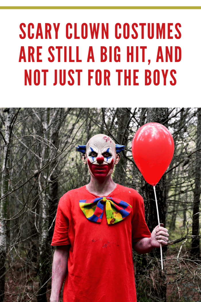 man in scary clown costume standing in woods with red balloon