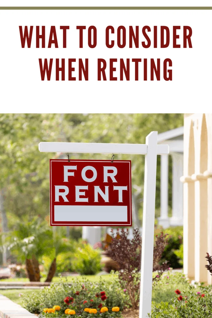 Red For Rent Real Estate Sign in Front House. for those wanting to consider renting