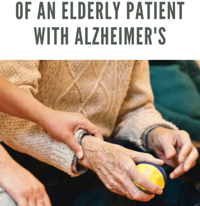 elderly patient with alzheimer's being cared for and using ball for therapy