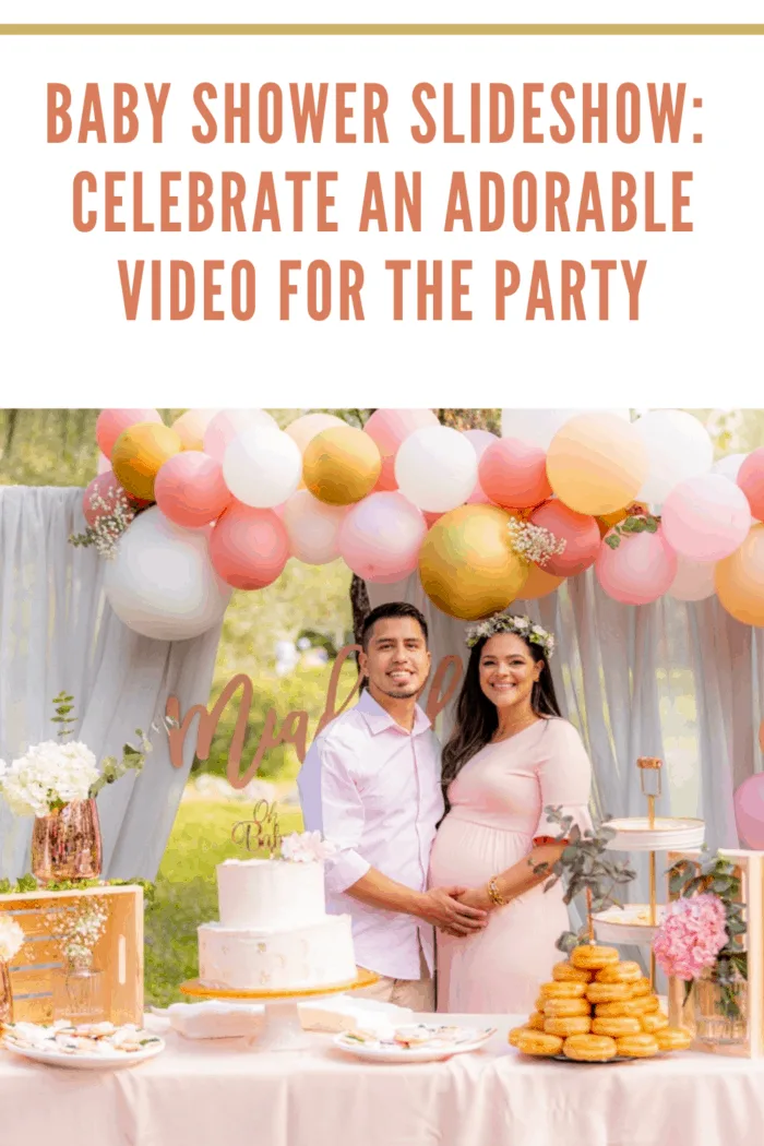 man with expecting wife posing in front of food table at baby shower