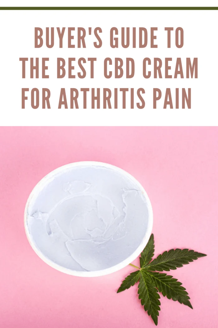 cbd cream on top of hemp leaf with pink background