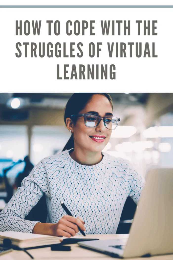 Smart young woman satisfied with learning language during online courses using netbook, smiling female student doing homework task in college library searching information via laptop computer