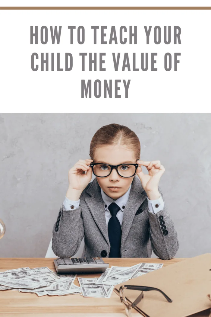 child dressed as businessperson learning the value of money