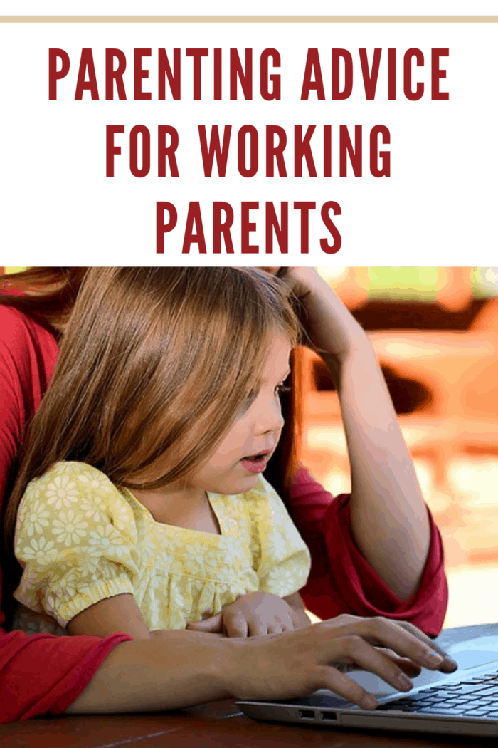 girl sitting on lap of working parent