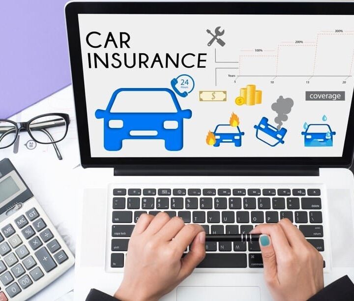 business hand using computer with car insurance policy page for car insurance renewal concept accident prevention coverage.