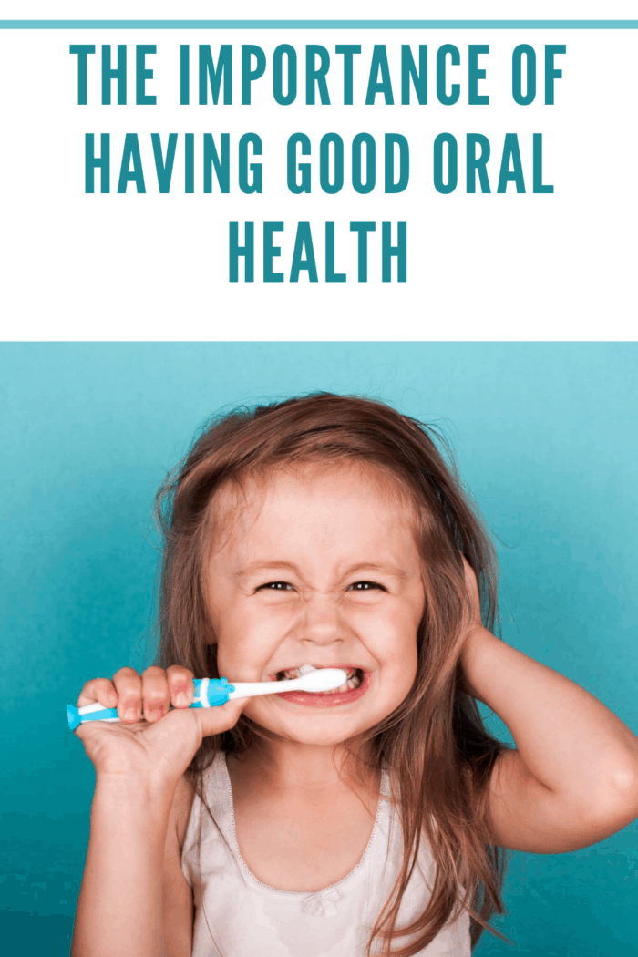 little girl enthusiastically brushing her teeth knowing the importance of good oral health care