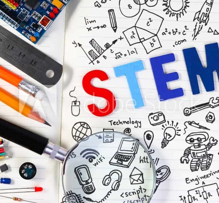 STEM education. Science Technology Engineering Mathematics. STEM concept with drawing background. Education background.STEM education. Science Technology Engineering Mathematics. STEM concept with drawing background. Magnifying glass over education backgr