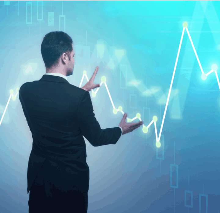 Businessman with forex chart standing on abstract glowing background. Broker and finance concept