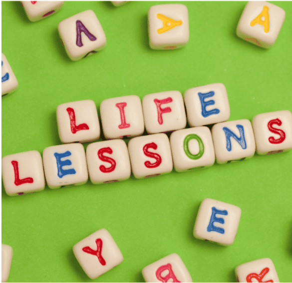 LIFE LESSONS spelled in letters on a green background