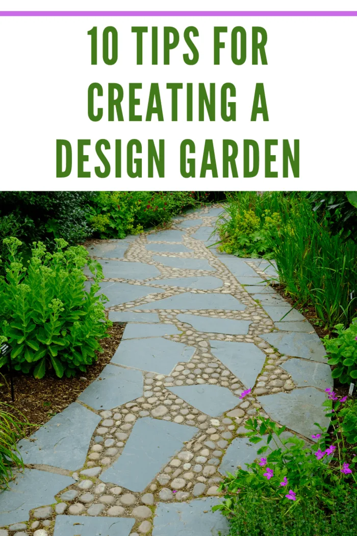 Individually designed garden path separating perennial borders with flowering day lilies.
