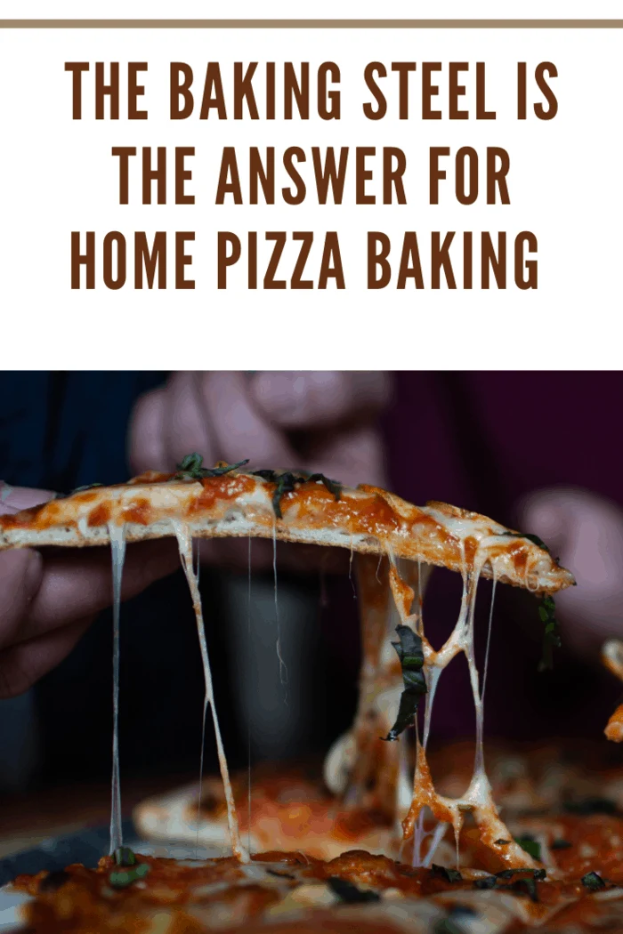 hands lifting fresh pizza slice off pan with strings of cheese