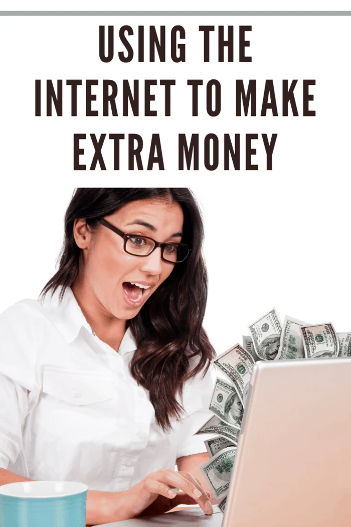 Stack of money popping out from the laptop computer while girl browsing online. depicting using the internet to make extra money