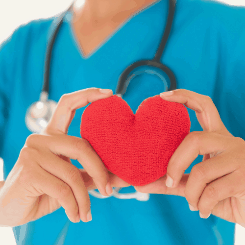 nurse hands holding red heart. Healthcare And Medical concept.