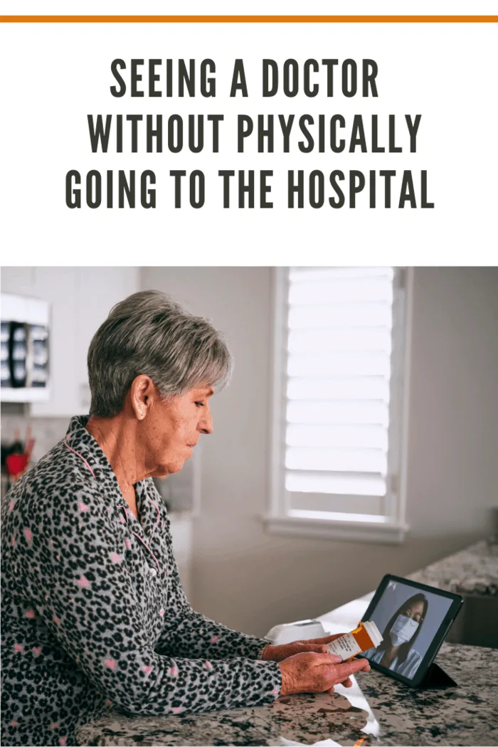 A senior aged woman in her home, talking to a doctor online in a virtual appointment.