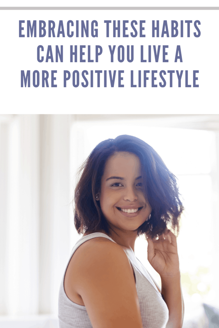 woman living a positive lifestyle looking at camera