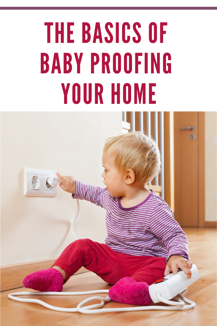 toddler playing with extension cord and outlet