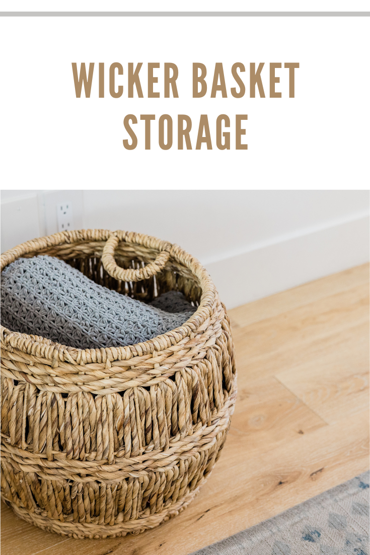 wicker basket with blankets and throws