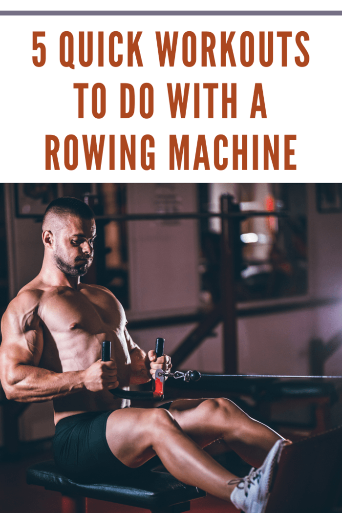 Young caucasian handsome muscular man doing rowing machine exercising in gym.