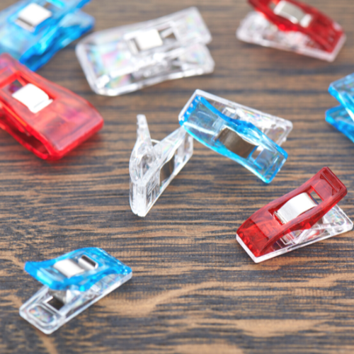 sewing clips in red, clear, and blue