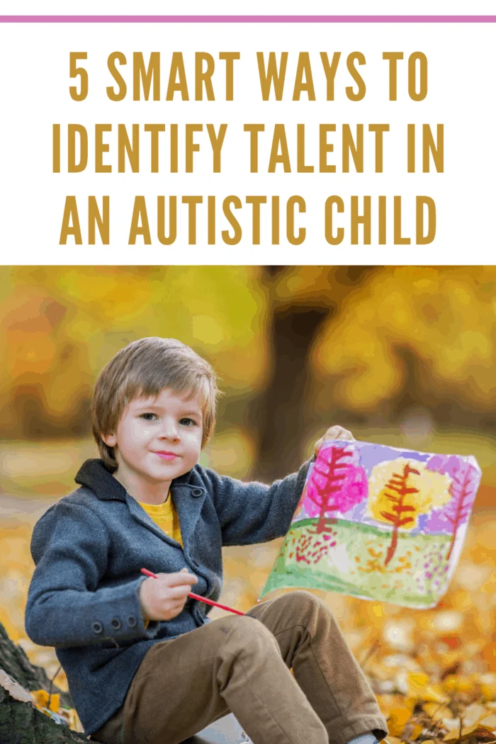 Young autistic boy proudly displaying his drawing showcasing his artistic talent identify talent in an autistic child