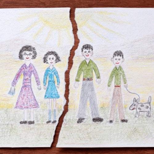 Torn child's drawing of their happy family