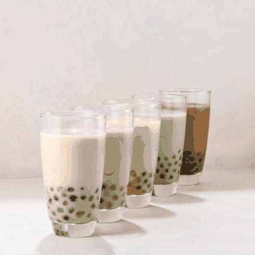 Various flavored buble tea or boba tea with straws on white background