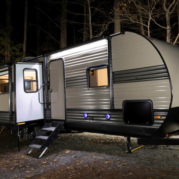 Long trailer at a campsite at Jordan Lake in late autumn