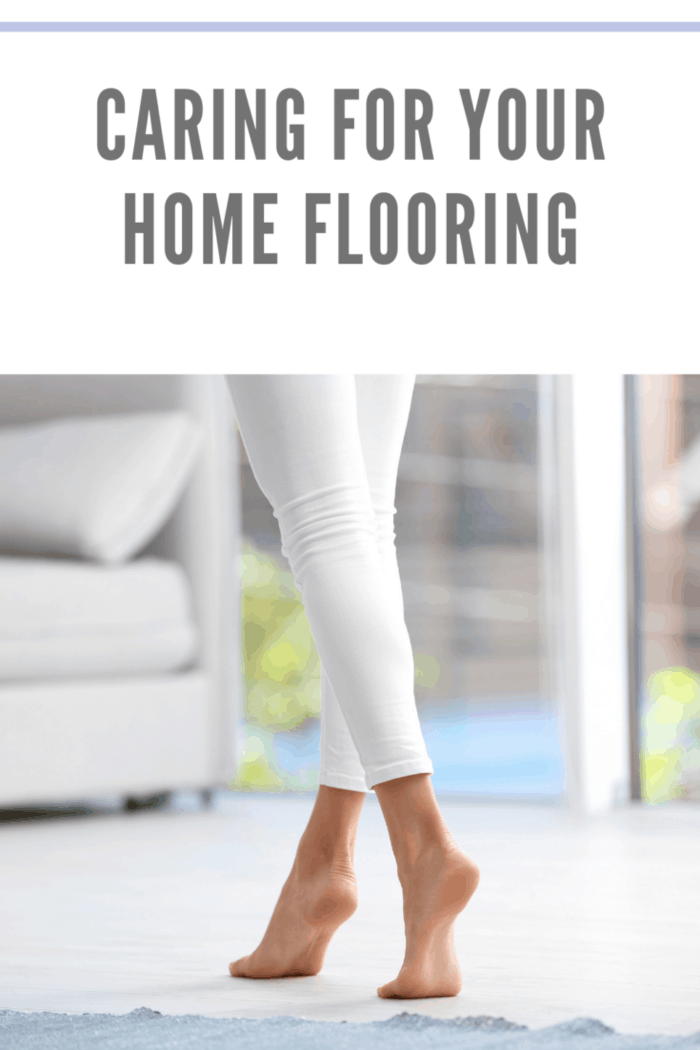 Woman walking barefoot at home. Floor heating