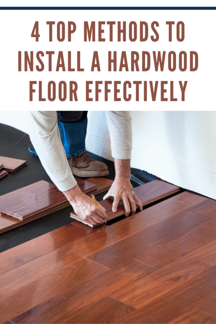 A worker installing hardwood floor in an American upscale home.A worker installing hardwood floor in an American upscale home.