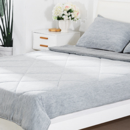 luxear cooling comforter on bed