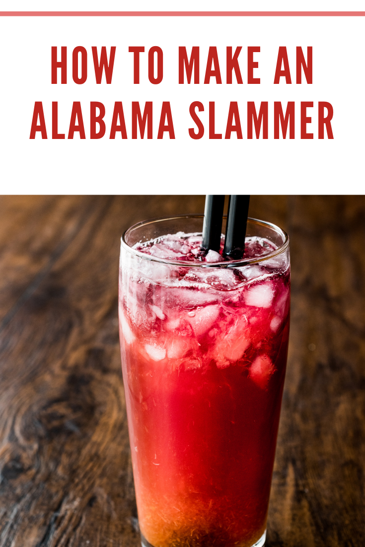 alabama slammer cocktail with black straw