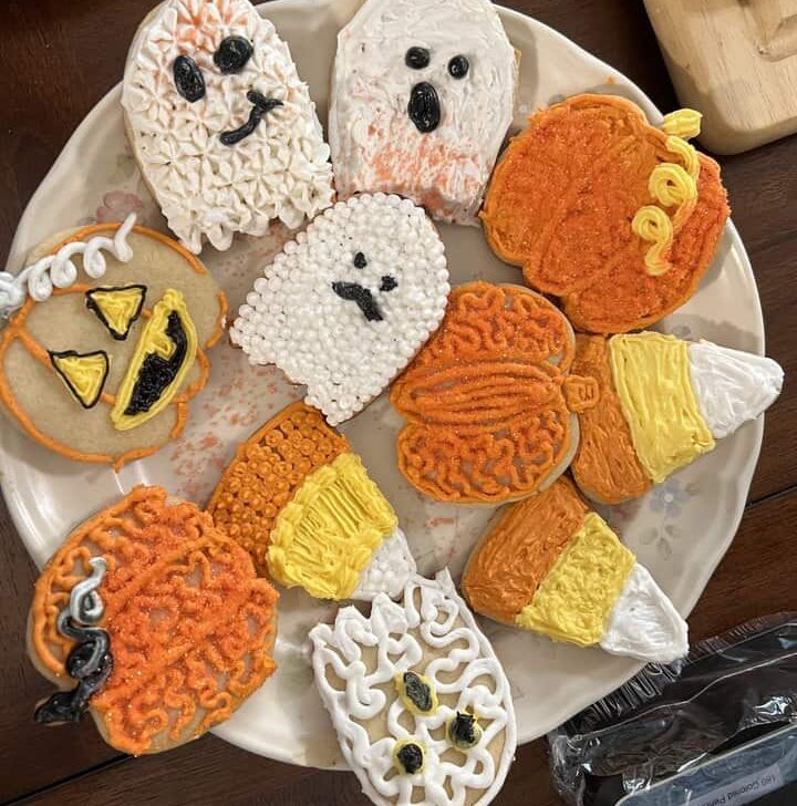 Roll out cookie dough shaped with Wilton cutters into festive holiday cookie shapes.