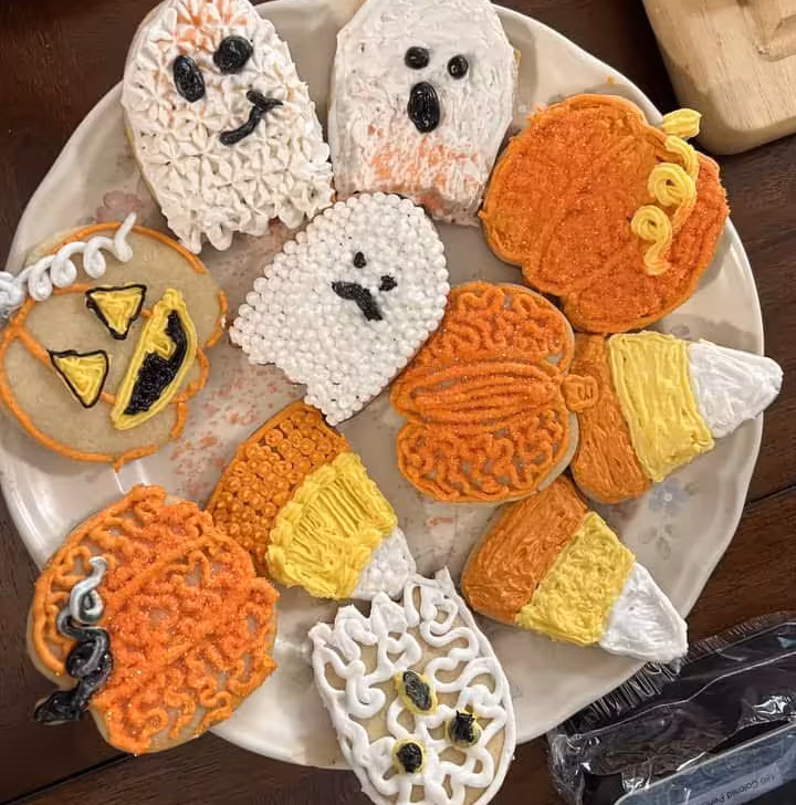 Roll out cookie dough shaped with Wilton cutters into festive holiday cookie shapes.