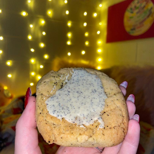 Taylor Swift Chai Cookie in hand