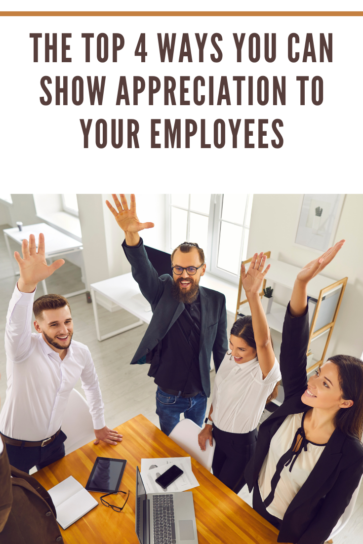 Team of Enthusiastic Business People Raising Arms in Work Meeting Celebrating Successful Teamwork