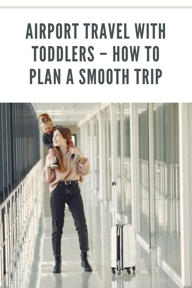 toddler on mom's shoulders at airport