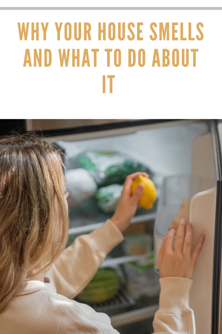 woman taking lemon out of fridge